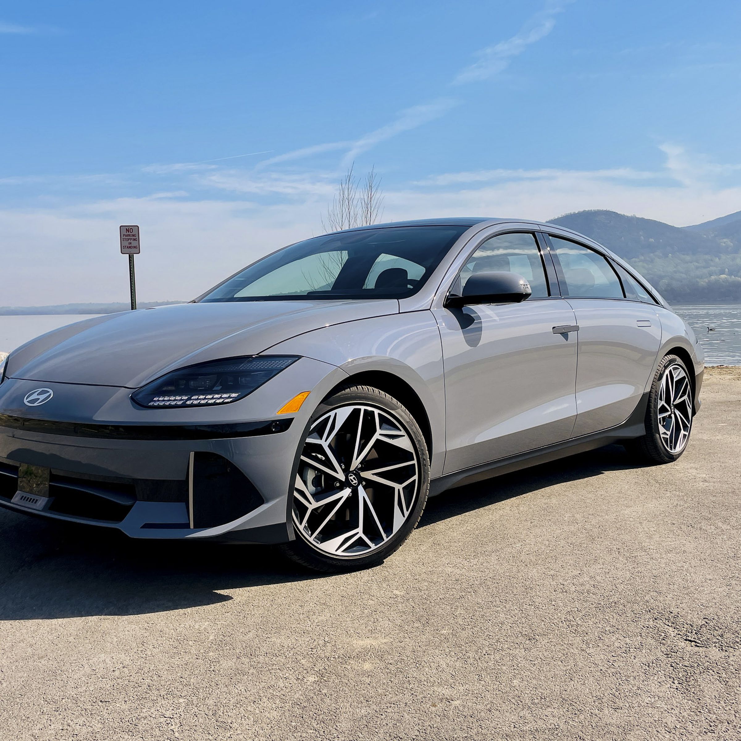 silver Hyundai Ioniq 6 sedan by the water