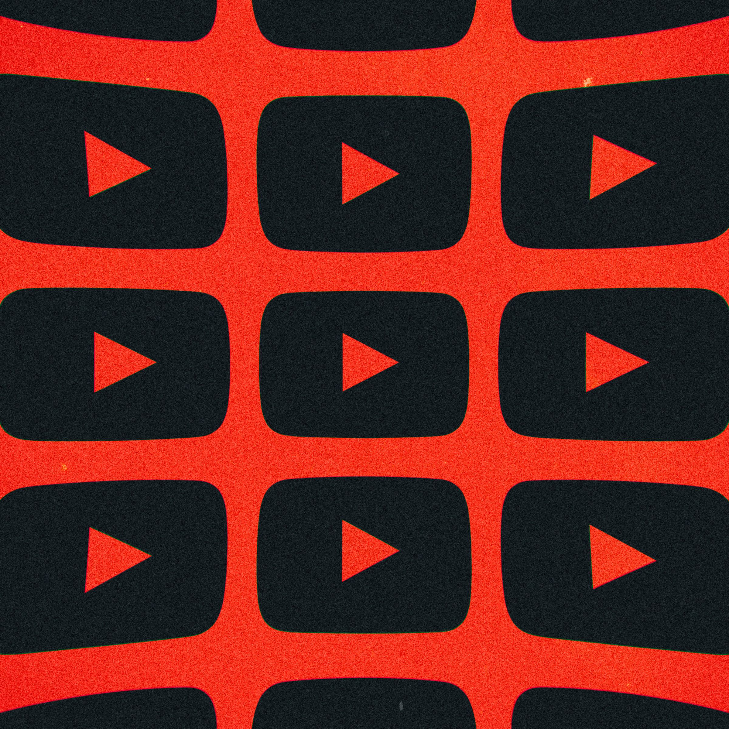 A collage of YouTube logos on a red background.