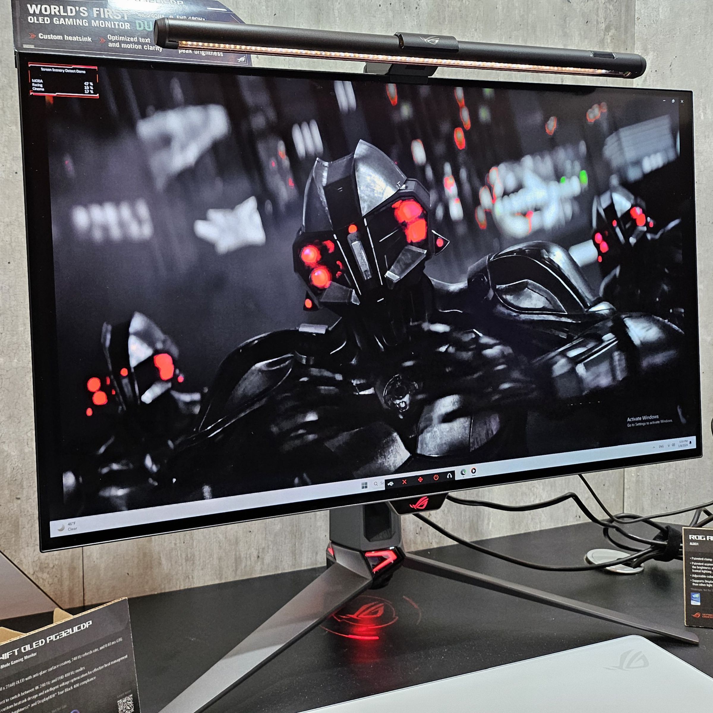 An Asus ROG Swift PG32UCDM on display at a booth from CES 2024.