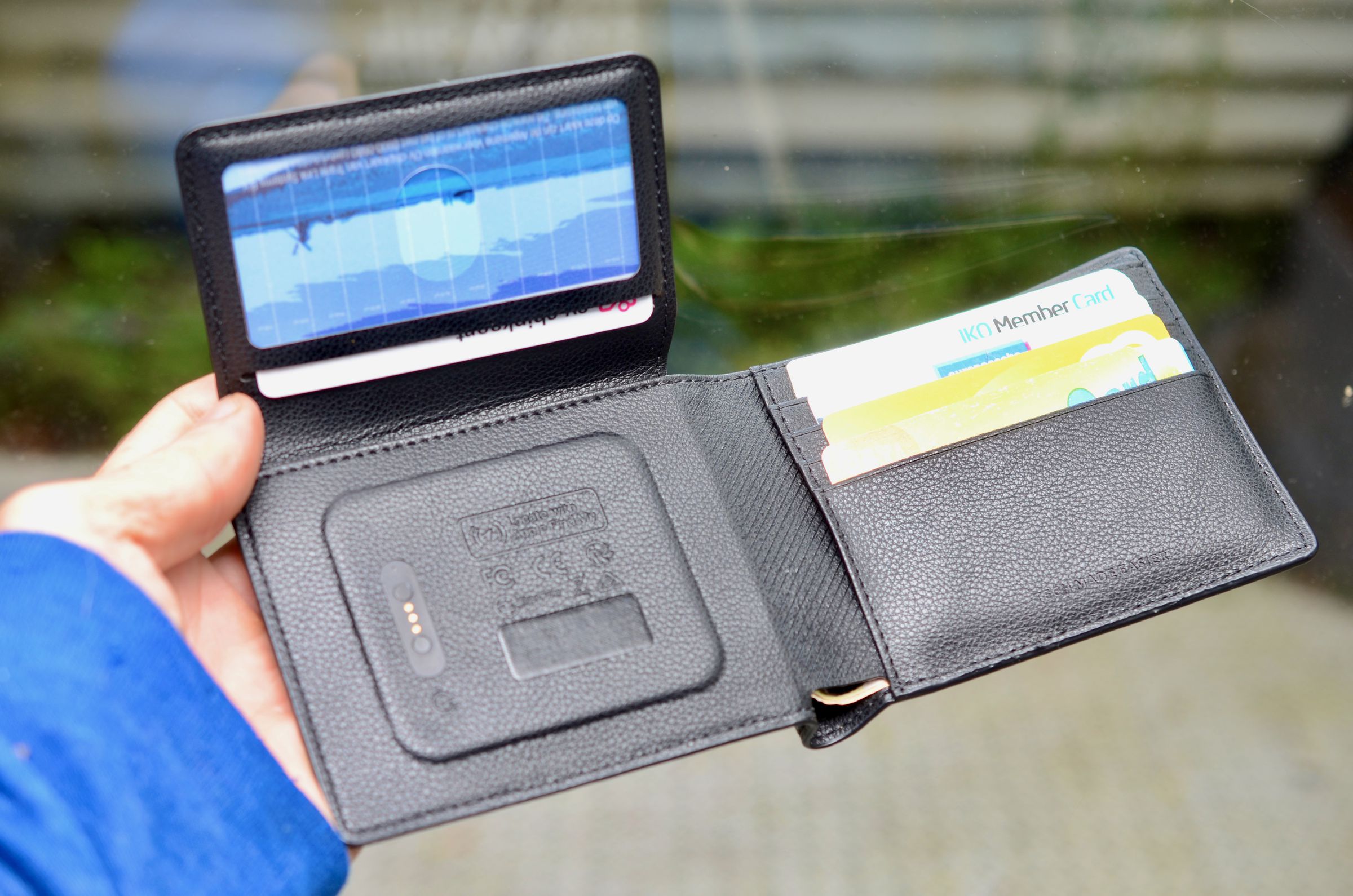 <em>The tracker is under the flap and produces an audible tone that’s a little louder than an AirTag which should help you locate the wallet when lost.</em>