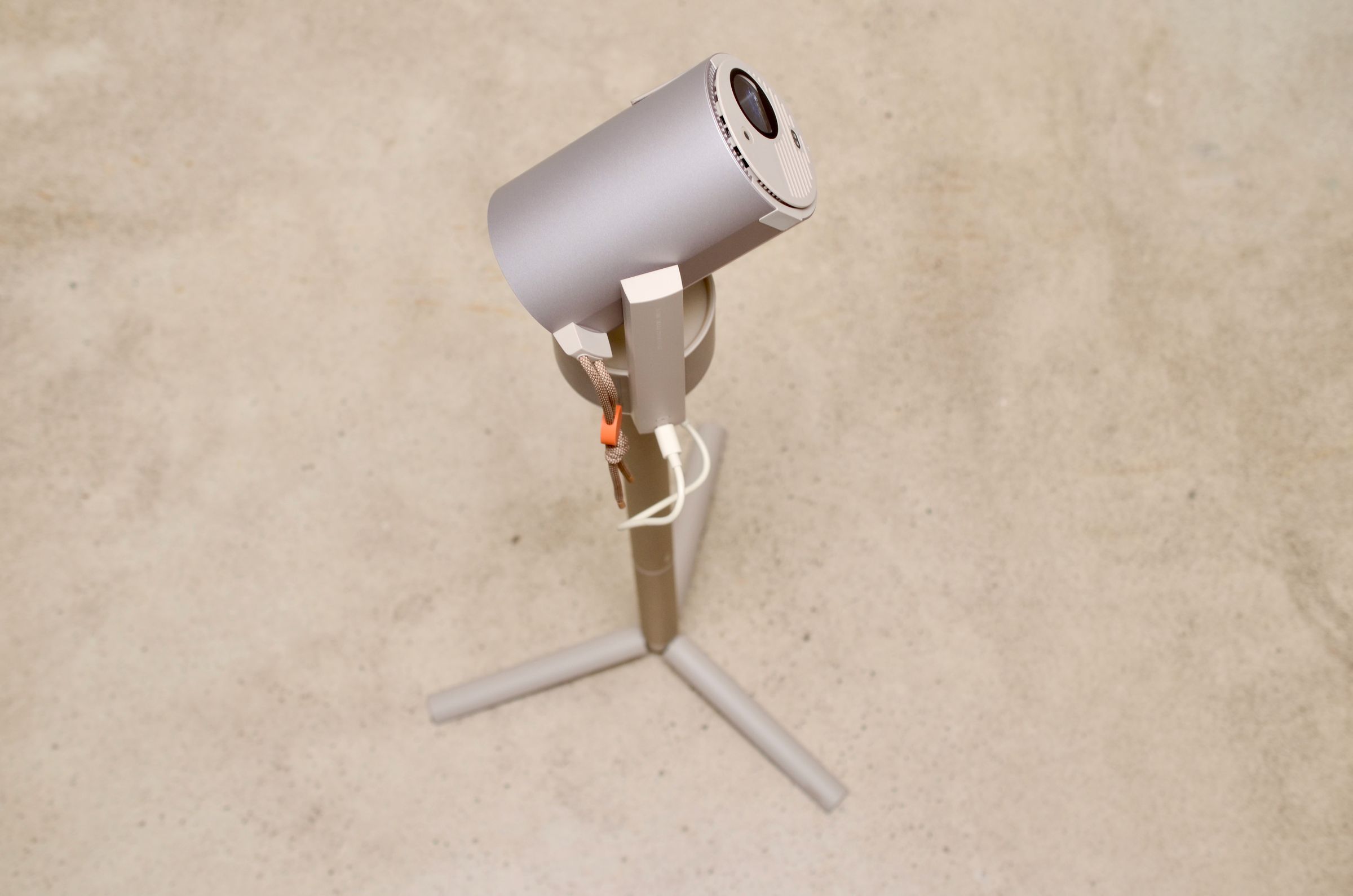 <em>The PowerBase Stand consists of two 16.1-inch sections to create a short tripod or a longer 26.1-inch tripod with 20,000mAh battery. In my testing, that’s enough power for about two-hours of continuous playback when the projector is in Eco mode.</em>