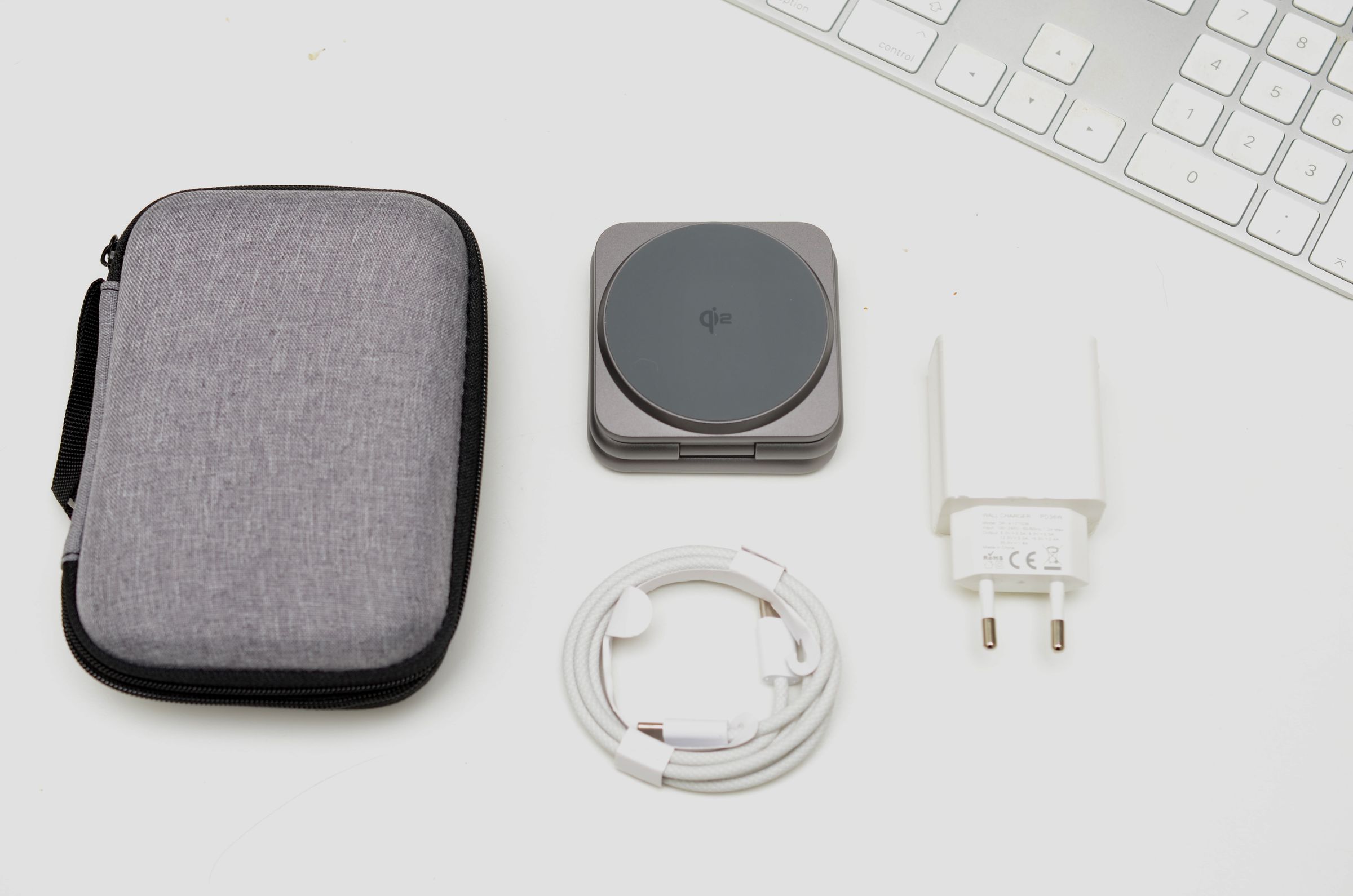 <em>It ships with a 36W USB-C charger, cable, and carrying case.</em>