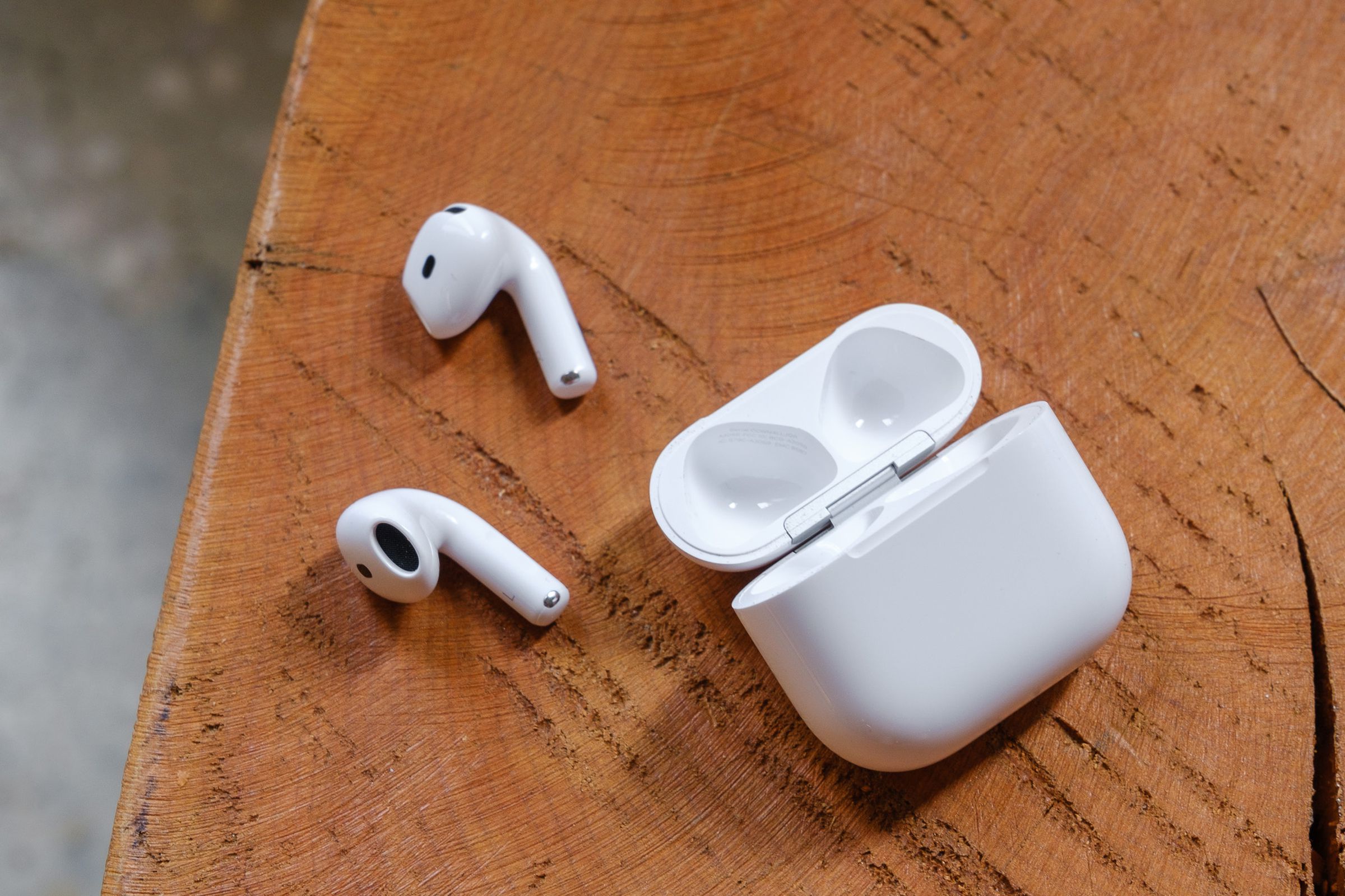 A hands-on photo of Apple’s AirPods 4 wireless earbuds.