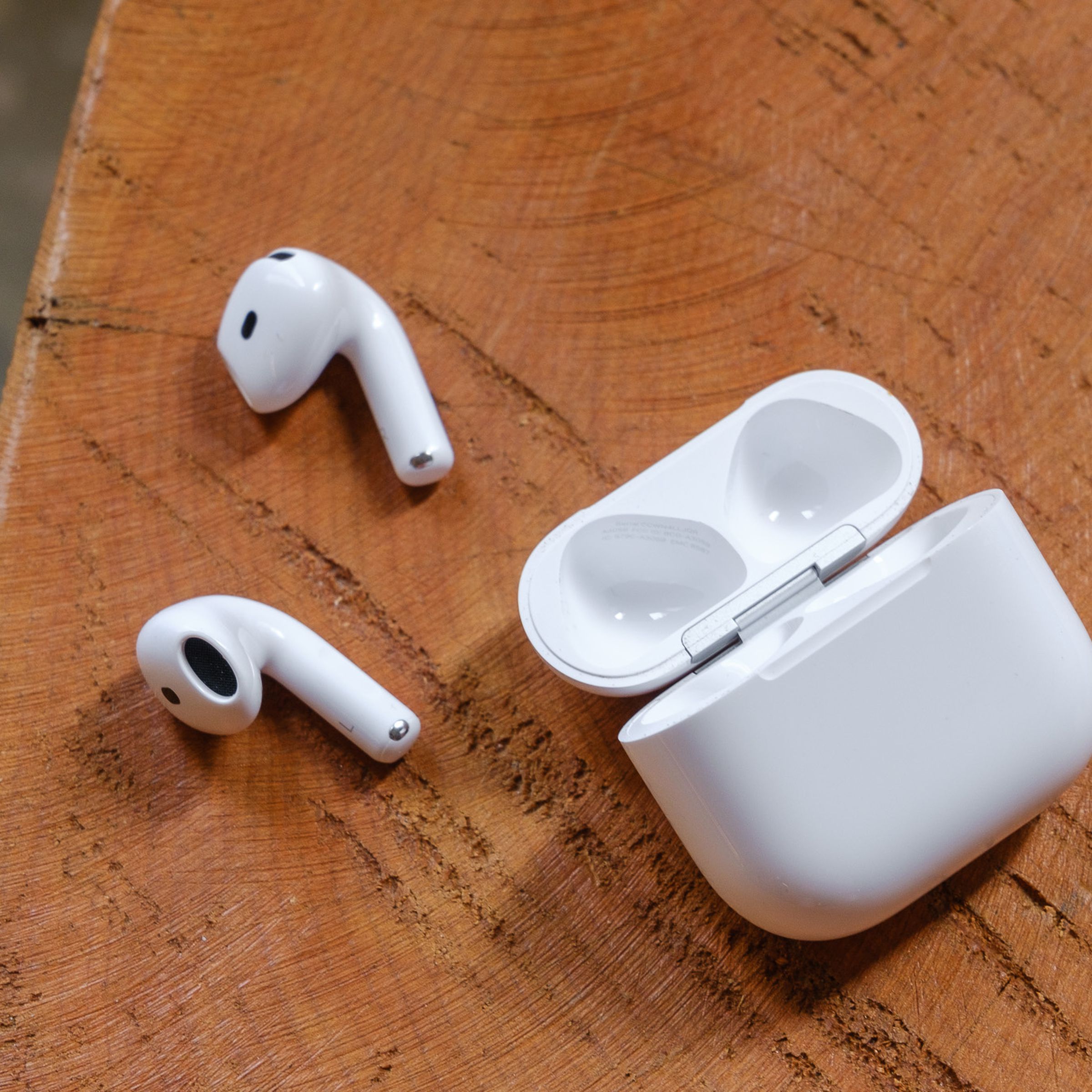 A hands-on photo of Apple’s AirPods 4 wireless earbuds.