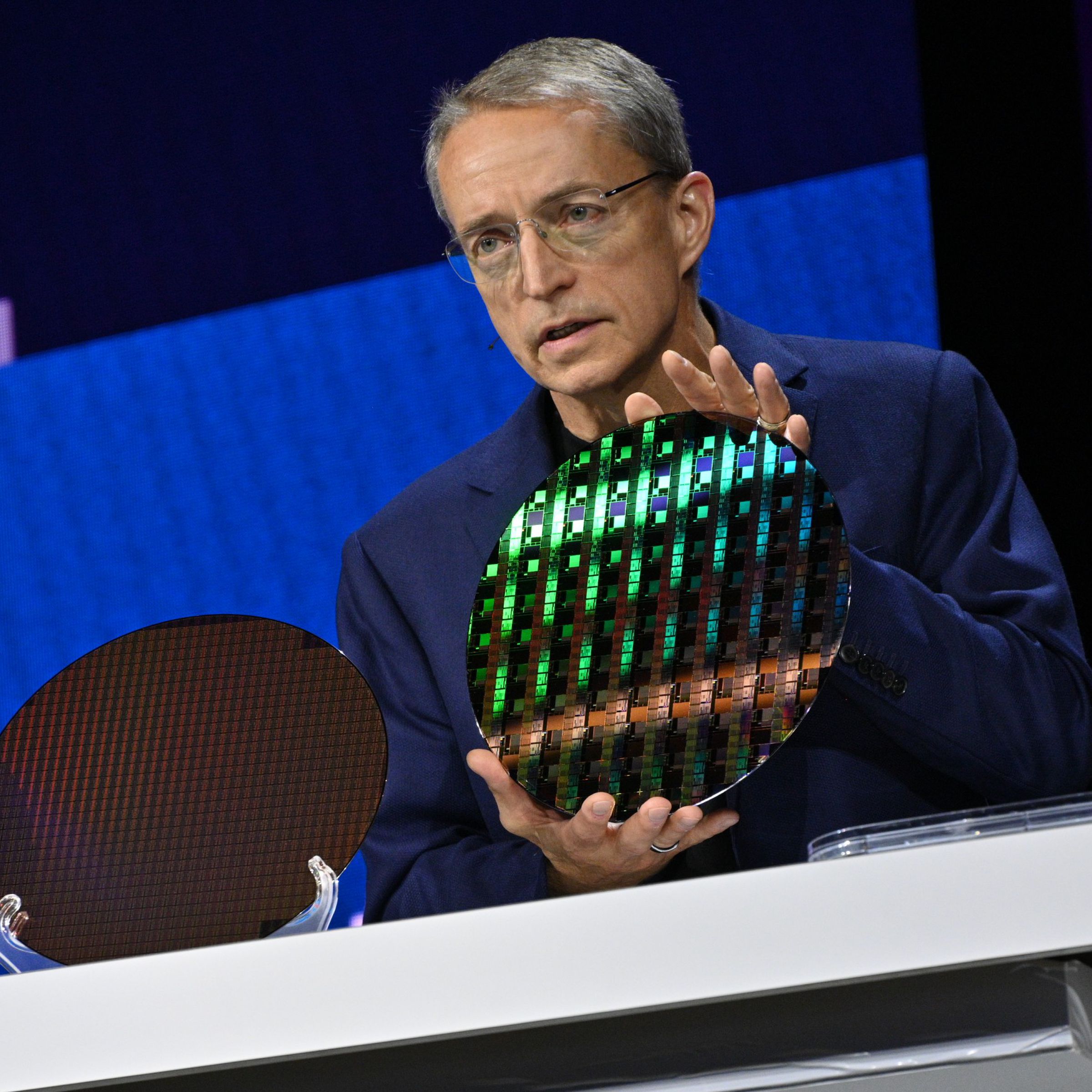 Intel CEO Pat Gelsinger holds up an early Intel 18A wafer in late 2023.