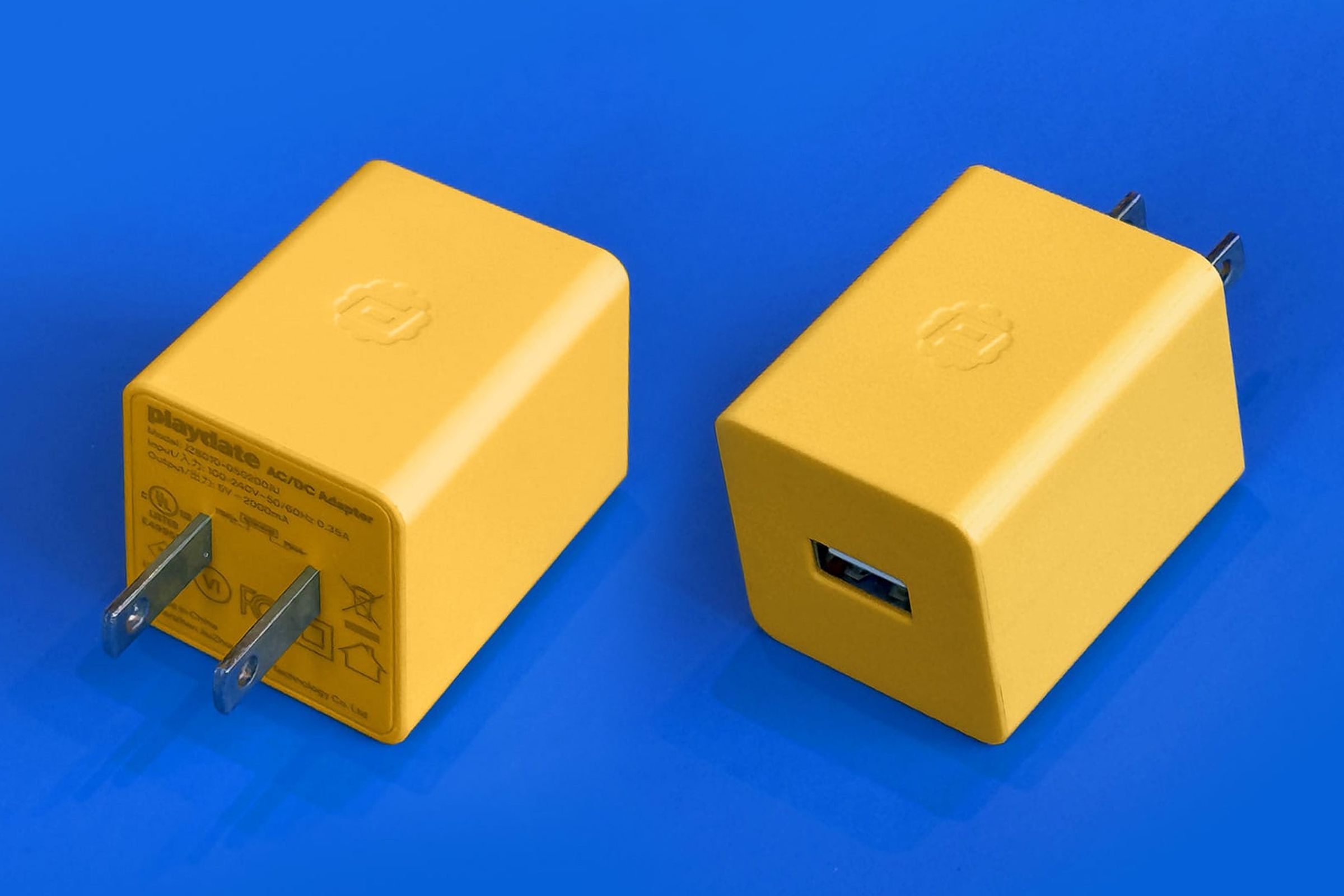 The Panic Playdate’s new yellow power adapter.